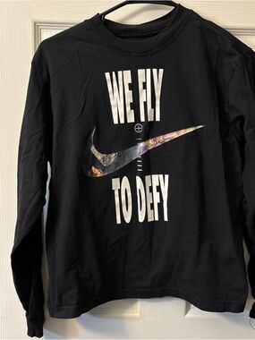 Nike Black Long-Sleeve Tee with Metallic Swoosh and White Graphic